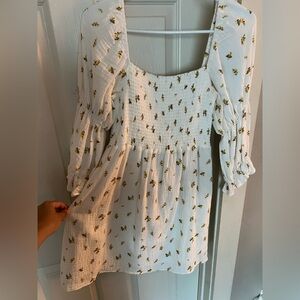 Beautiful spring mini dress with long cinched, sleeves. 100% cotton